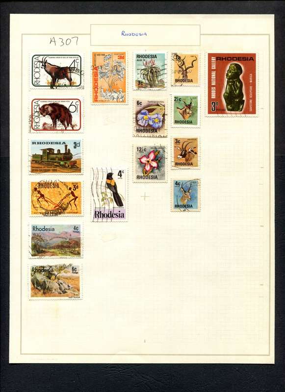 Rhodesia - 16 Stamps Mounted (Hinged) on Old Album Page