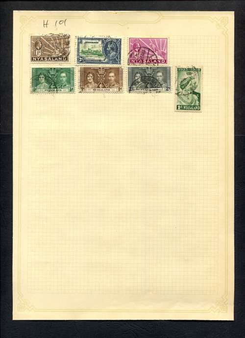 Nyasaland - 7 Stamps Mounted (Hinged) On Old Album Page