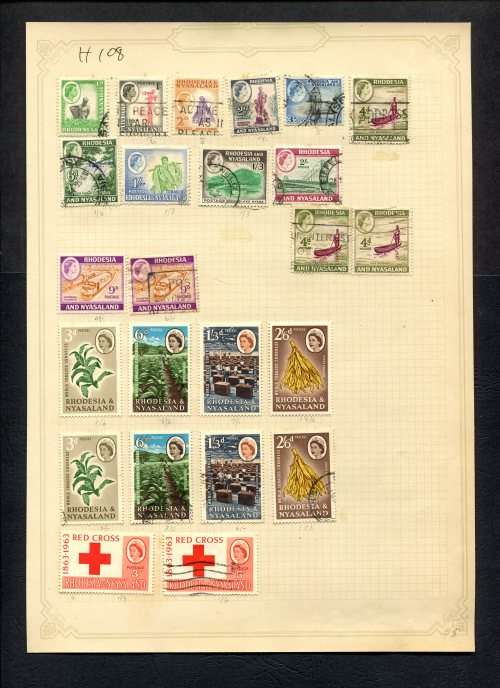 Rhodesia and Nyasaland - 24 Stamps Mounted (Hinged) On Old Album Page