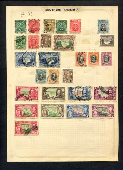 Southern Rhodesia - 28 Stamps Mounted (Hinged) On Old Album Page