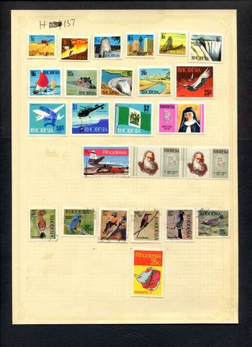 Rhodesia - 25 Stamps Mounted (Hinged) On Old Album Page