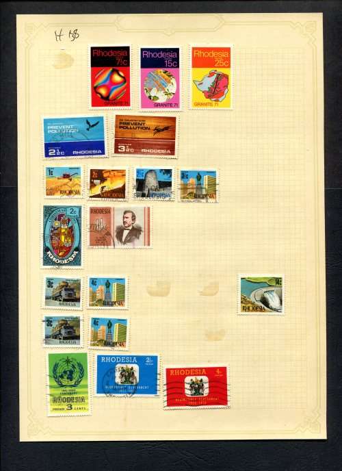 Rhodesia - 19 Stamps Mounted (Hinged) On Old Album Page