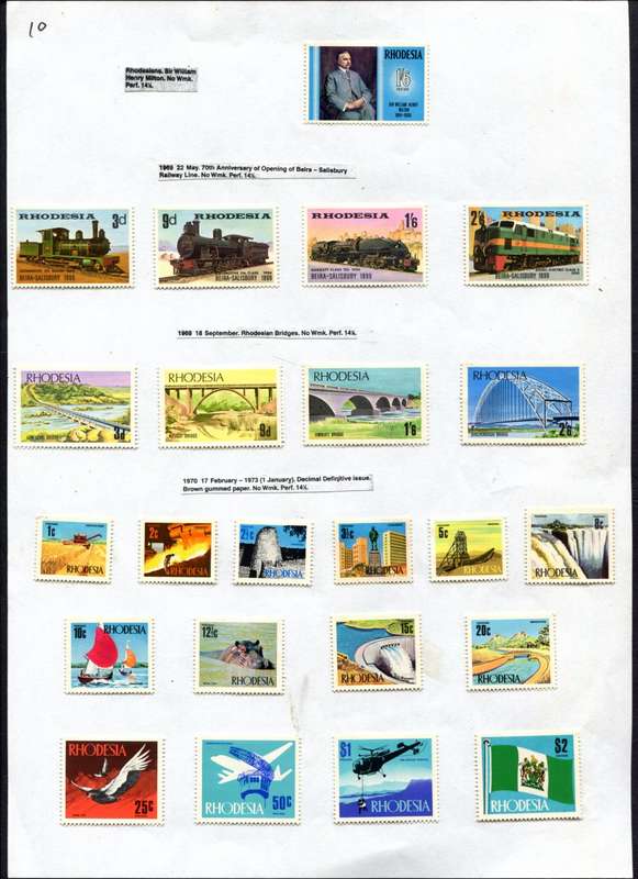 Rhodesia - 23 Stamps Mounted (Hinged) on Old Album Page
