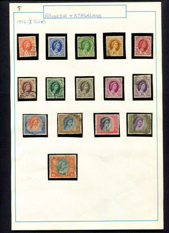 Rhodesia and Nyasaland - 15 Stamps Mounted (Hinged) on Old Album Page