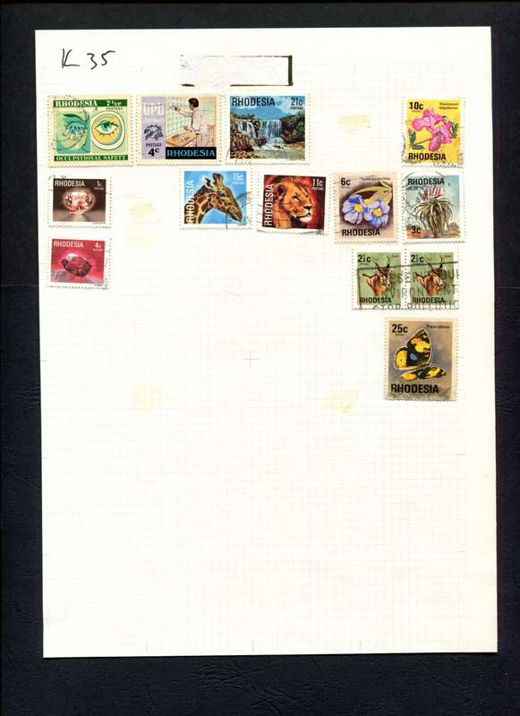 Rhodesia - 13 Stamps Mounted (Hinged) On Album Page