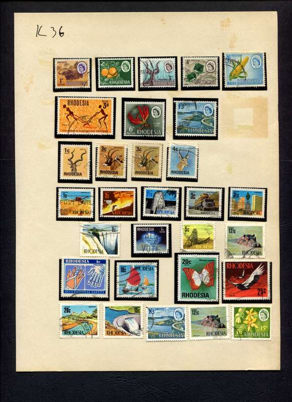 Rhodesia - 30 Stamps Mounted (Hinged) On Album Page