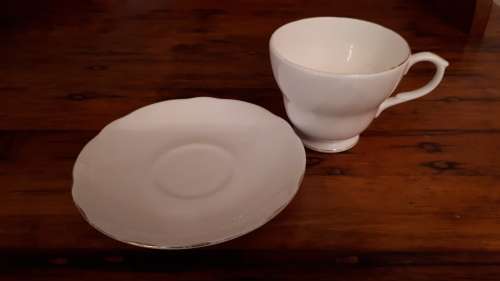 VINTAGE DUCHESS BONE CHINA (England) white tea cup and saucer duo