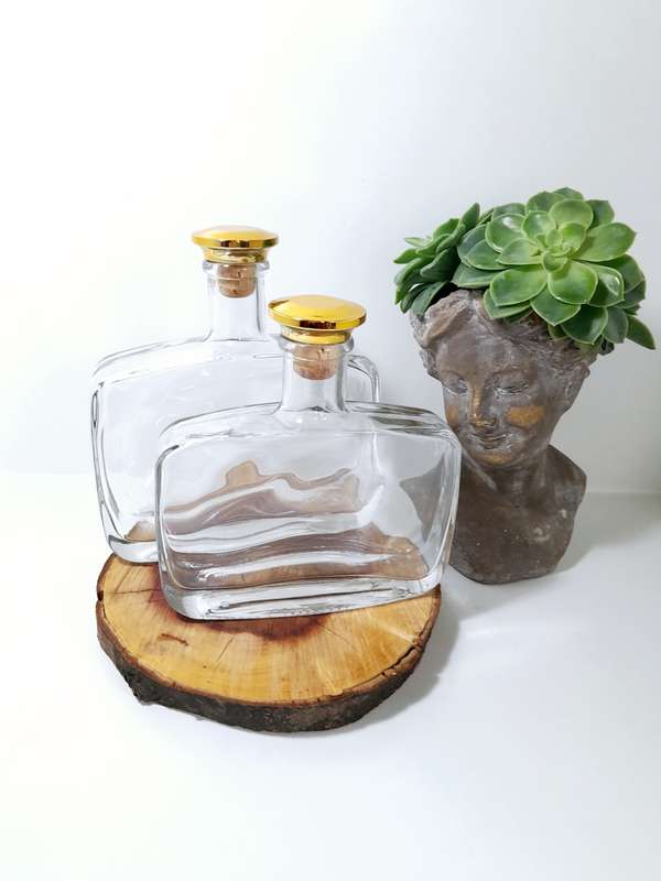Two Heavy Glass Rectangular Graduating Decanters