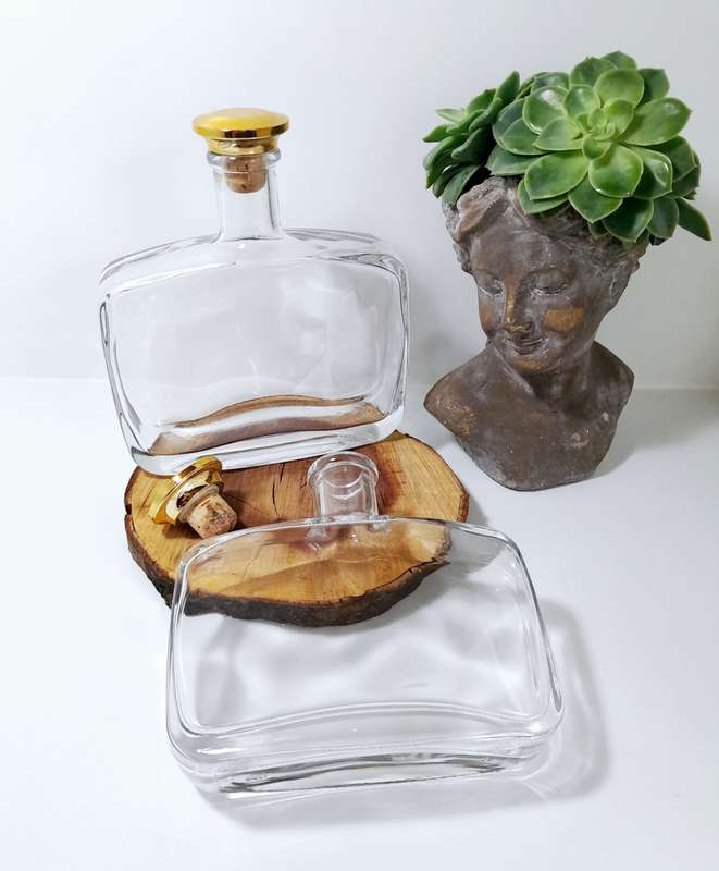 Two Heavy Glass Rectangular Graduating Decanters