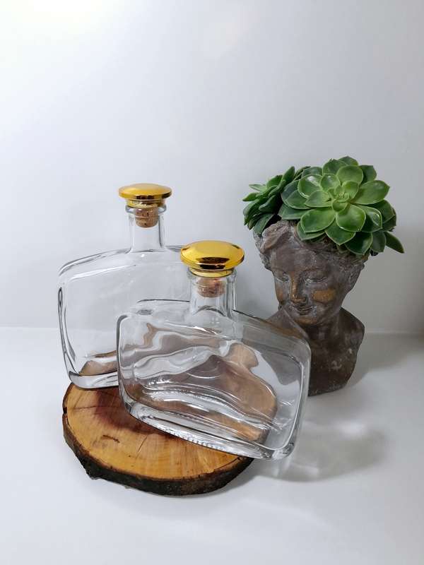 Two Heavy Glass Rectangular Graduating Decanters