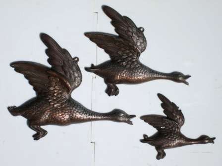 Set of three retro mid century metal flying ducks made in Denmark