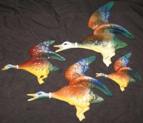 Set of four Lucia Ware flying ducks