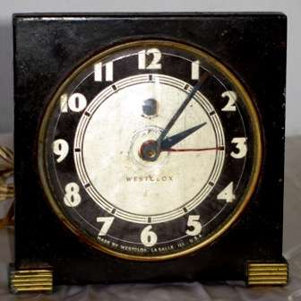 Art Deco "Westclox" electric travel alarm clock, made in U.S.A. ( 12 X 12.5 cm )