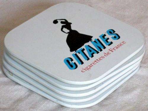 Set of retro, 1950s "Gitanes cigarettes de France" metal coasters