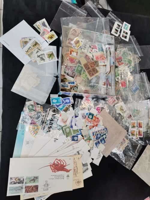 Mini Luckybox - lots of loose stamps, on piece, in plastic, mixed world and some SWA FDC`s