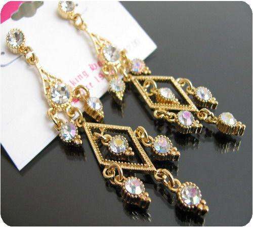 Exquisite 16 stone Genuine Crystal Earrings clad in 18K Yellow Gold !!