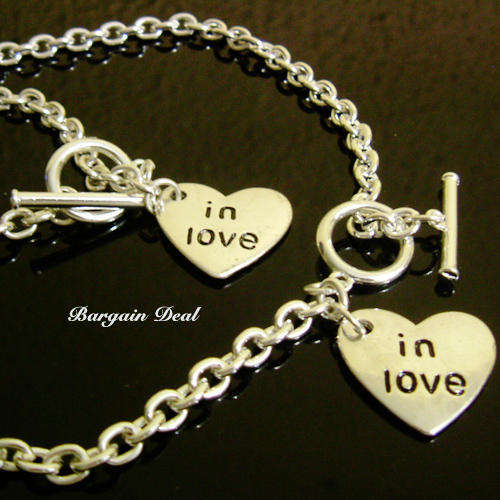 R100 only !! 2pcs Silver Bracelet and Necklace Set with " in love" heart shaped pendant !!