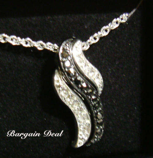 R90 only! Black & White Classic, Designer 21stone Genuine Crystal Curve Necklace from Avon!