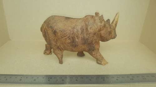 `Rhino On The Move` - Rhinoceros Sculpture Hand Carved From Zimbabwe Iron Wood.