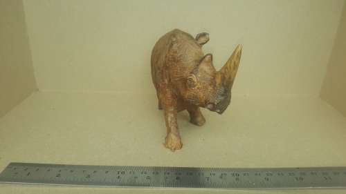 `Rhino On The Move` - Rhinoceros Sculpture Hand Carved From Zimbabwe Iron Wood.