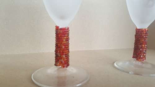 Beautiful Pair of Frosted Wine Glasses with Beaded stems.