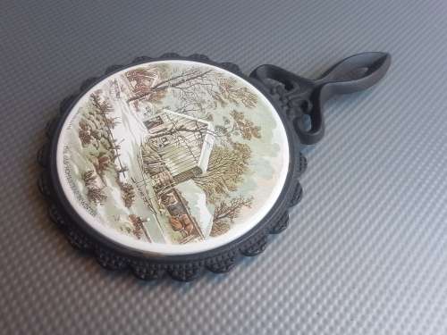 Vintage! Currier & Ives Cast Iron And Ceramic Trivets.