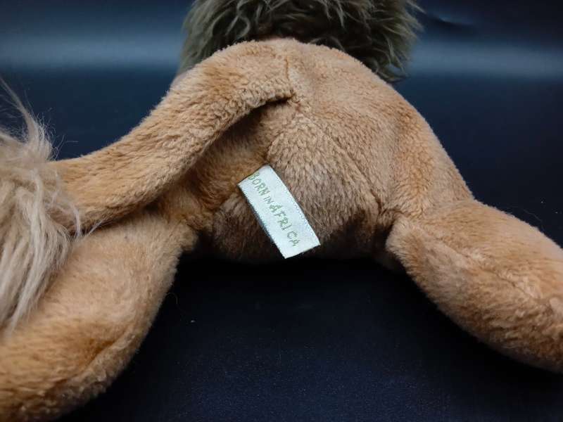 COLLECTION OF 6 BORN IN AFRICA STUFFED ANIMALS MOST WITH BEAN BAG TUMMY`S