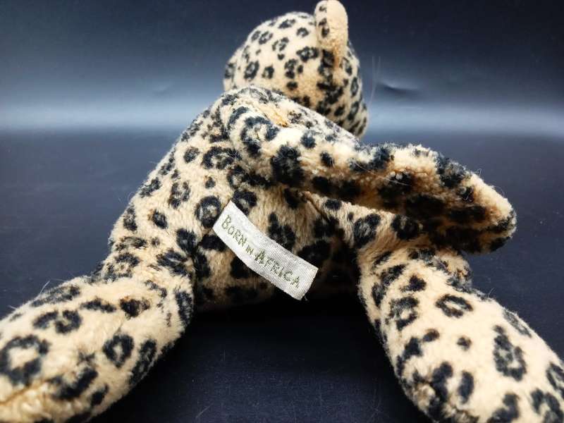 COLLECTION OF 6 BORN IN AFRICA STUFFED ANIMALS MOST WITH BEAN BAG TUMMY`S