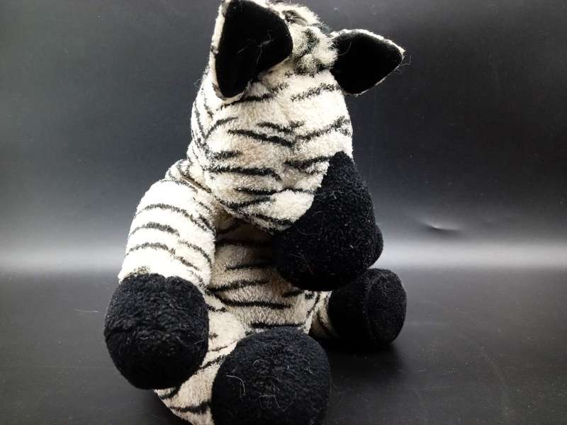 COLLECTION OF 6 BORN IN AFRICA STUFFED ANIMALS MOST WITH BEAN BAG TUMMY`S