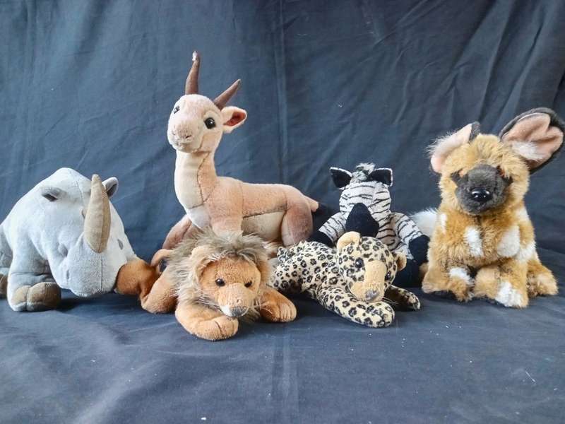 COLLECTION OF 6 BORN IN AFRICA STUFFED ANIMALS MOST WITH BEAN BAG TUMMY`S