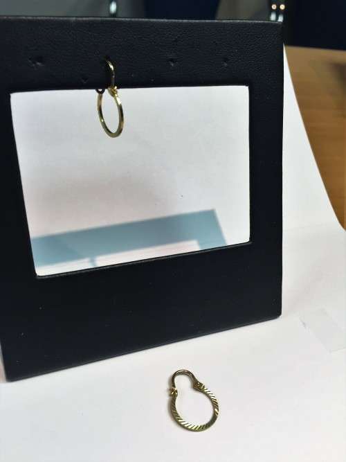 9 carat Solid Gold , Medium hoops--- Diamond cut facetted earrings