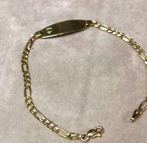 9 K /genuine 9 carat solid Gold --- stunning Imported I.D. bracelet with a cutout heart