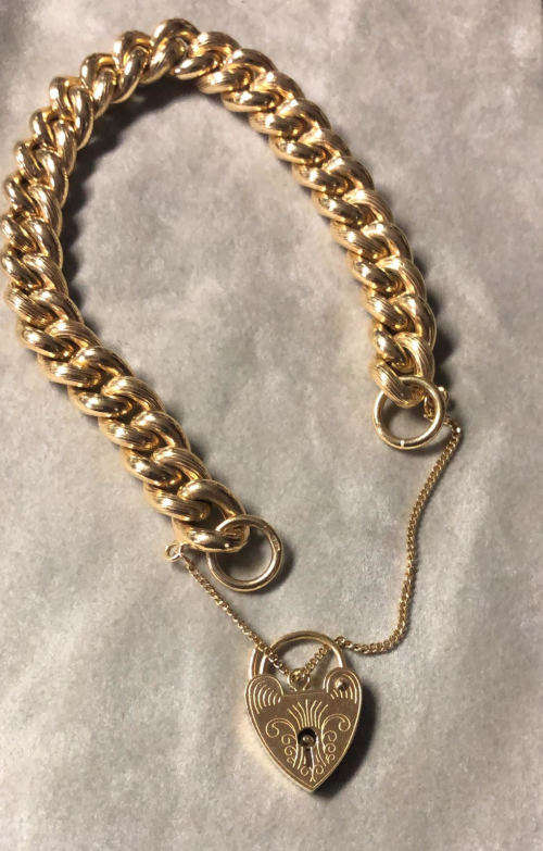 9K solid 9  carat  Gold  --- curb bracelet--- cm 20 long--9.5 mm. wide