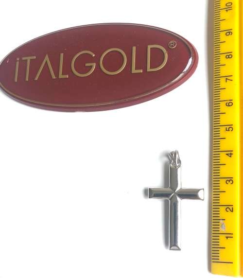 9K solid 9 carat white Gold , stunning imported cross- Shiny on one side and facetted onthe reverse