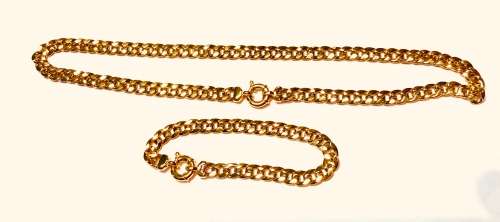 18K -solid 18 carat Yellow gold- Imported Curb link 7 mm wide--set of a bracelet and cm 45 necklace