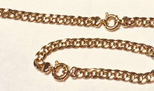 18K -solid 18 carat Yellow gold- Imported Curb link 7 mm wide--set of a bracelet and cm 45 necklace