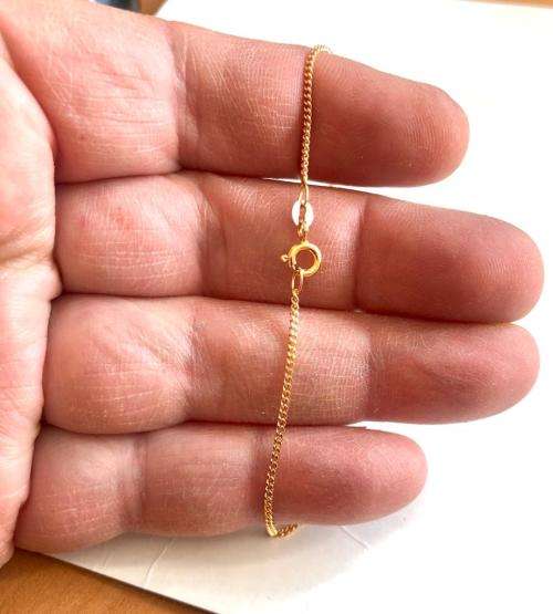 9k genuine,solid 9 carat Yellow Gold, curb necklace---------- cm 50 long -- mm 1.4wide