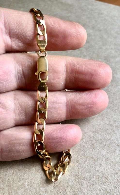 9k genuine,solid 9 carat Yellow Gold, bevelled curb Gents necklace cm 56 -mm 5.5 wide