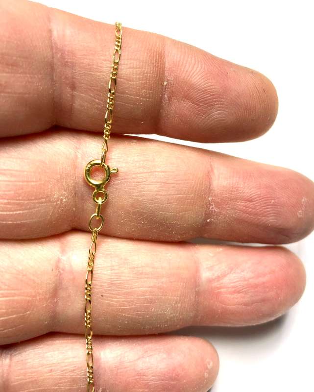 9k solid 9 carat Gold ----3/1 Link Figaro Anklet------- cm. 26 long ----1.5 mm. wide