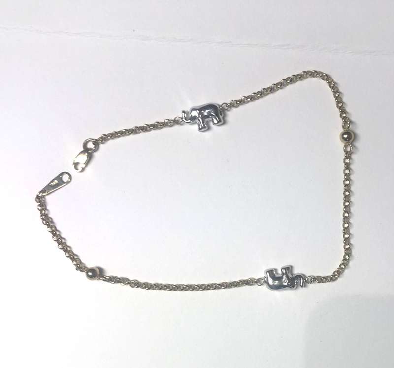9k solid 9 carat Gold ---rolo Link Anklet--- cm. 26 long ----2 white Elephants wide mm 7.5