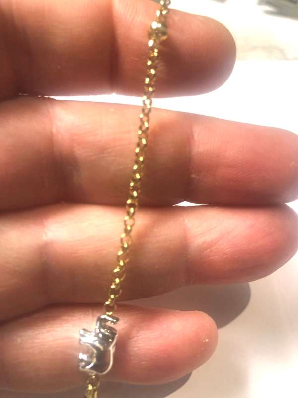 9k solid 9 carat Gold ---rolo Link Anklet--- cm. 26 long ----2 white Elephants wide mm 7.5