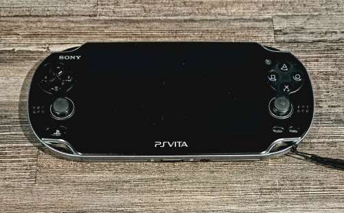 PS Vita + Games + Charger - Free Shipping