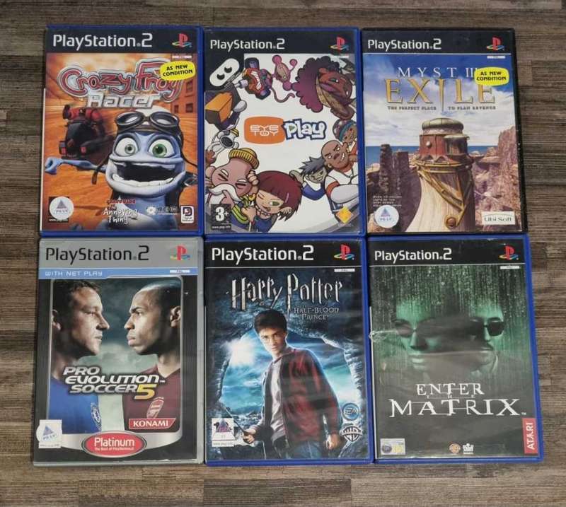 PS2 Console + 2 Controllers + Games