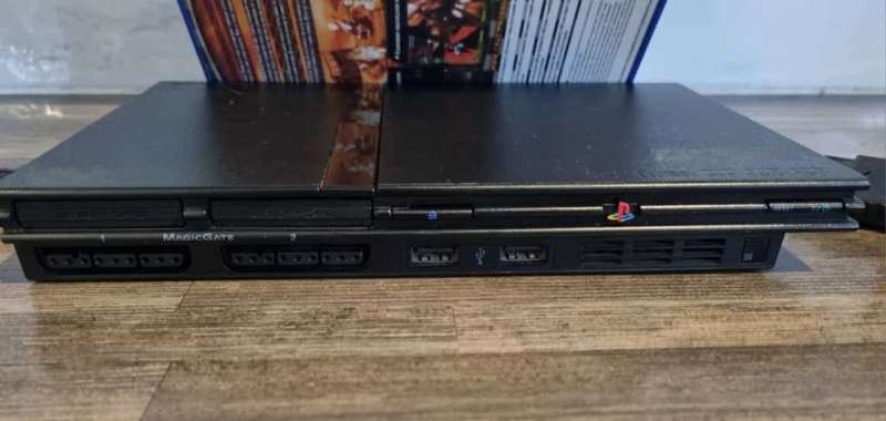 PS2 Console + 2 Controllers + Games
