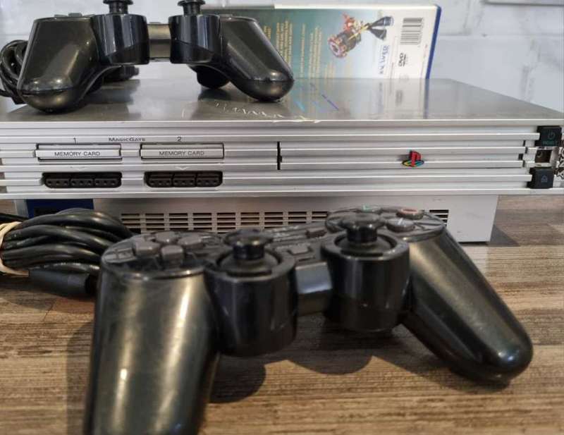 PS2 Console + 2 Controllers + Games