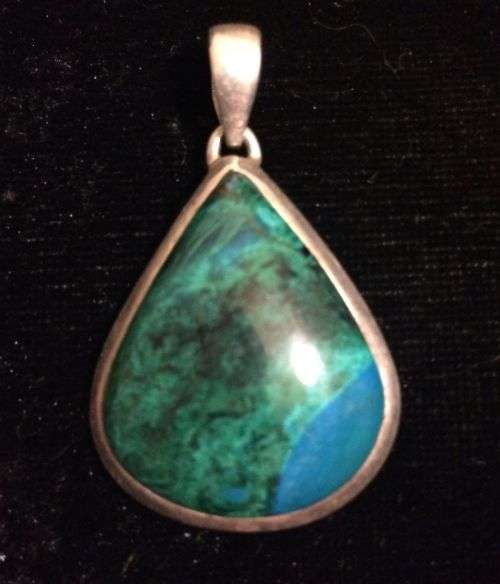 Large polished chrysocolla pendant set in 925 silver