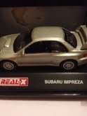 REAL X SUBARU IMPREZA 1:87 SILVER