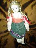 VINTAGE FABRIC AND PORCELAIN DOLL