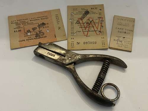 OLD TRAIN CONDUCTOR TICKET PUNCH WITH SOME OLD TICKETS 1960s
