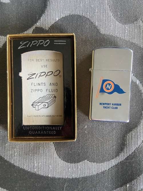 NEVER USED ZIPPO SLIM LIGHTER GENUINE ZIPPO